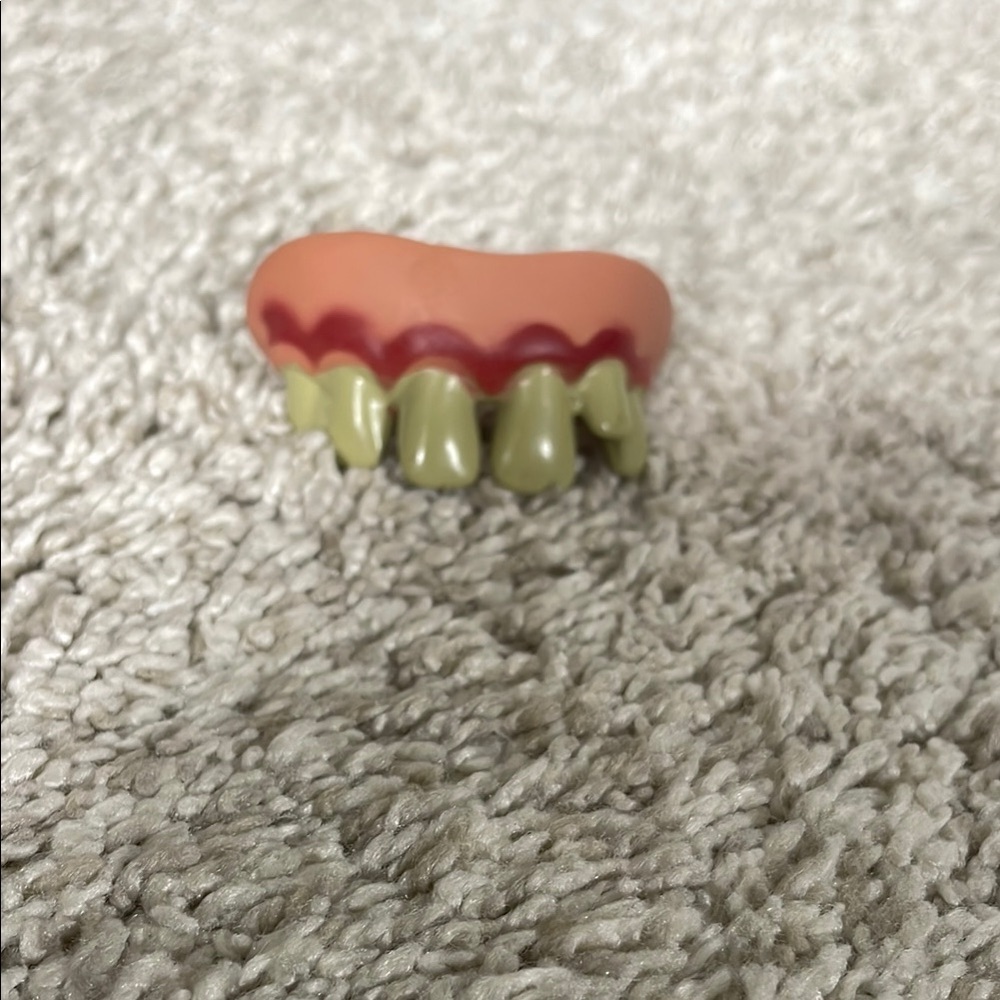 Red and Yellow Novelty Teeth Accessory